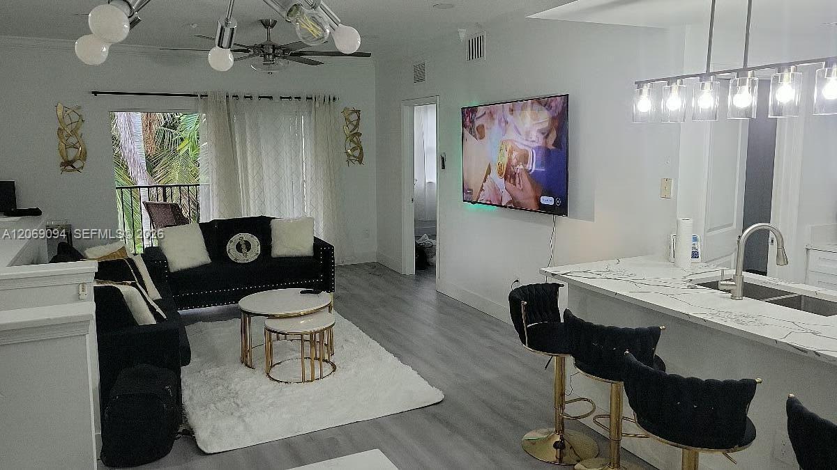 5840 W Sample Rd # 302, Coral Springs FL 33067