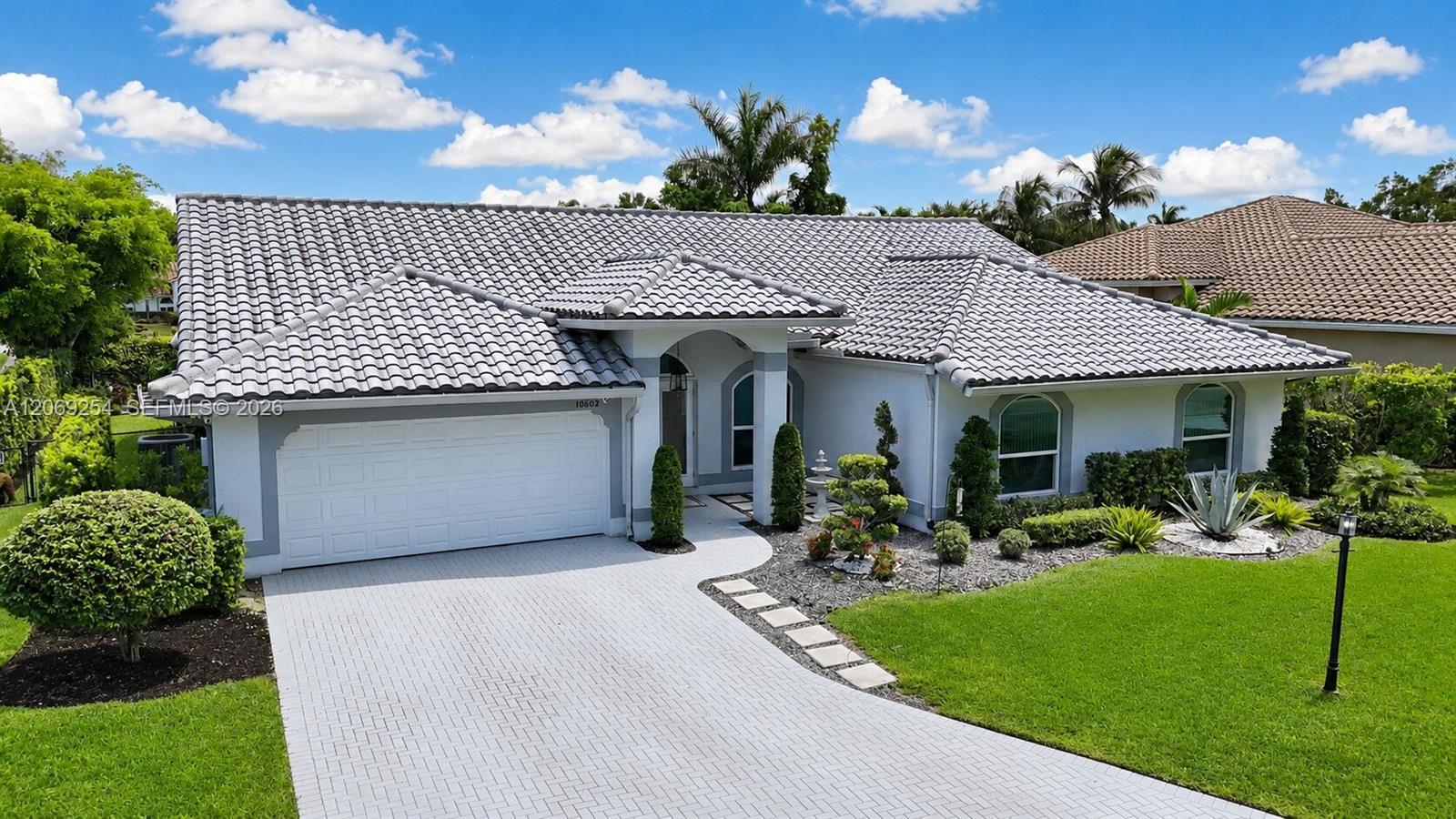 10602 NW 49th Pl, Coral Springs FL 33076 photo 2