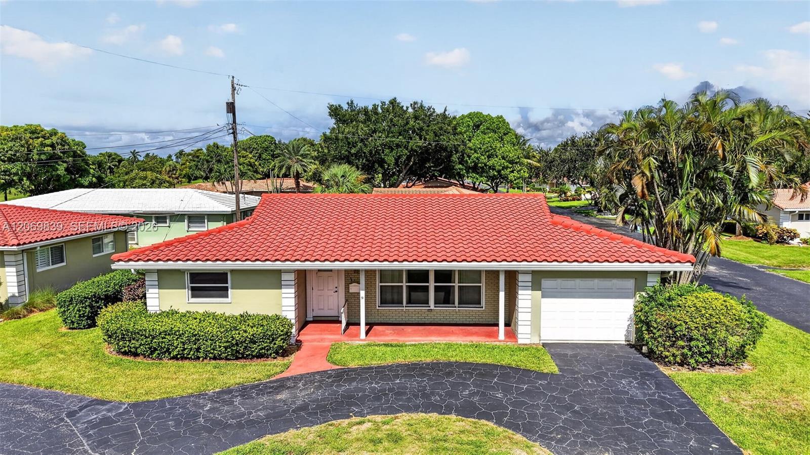 7118 E Tropical Way, Plantation FL 33317