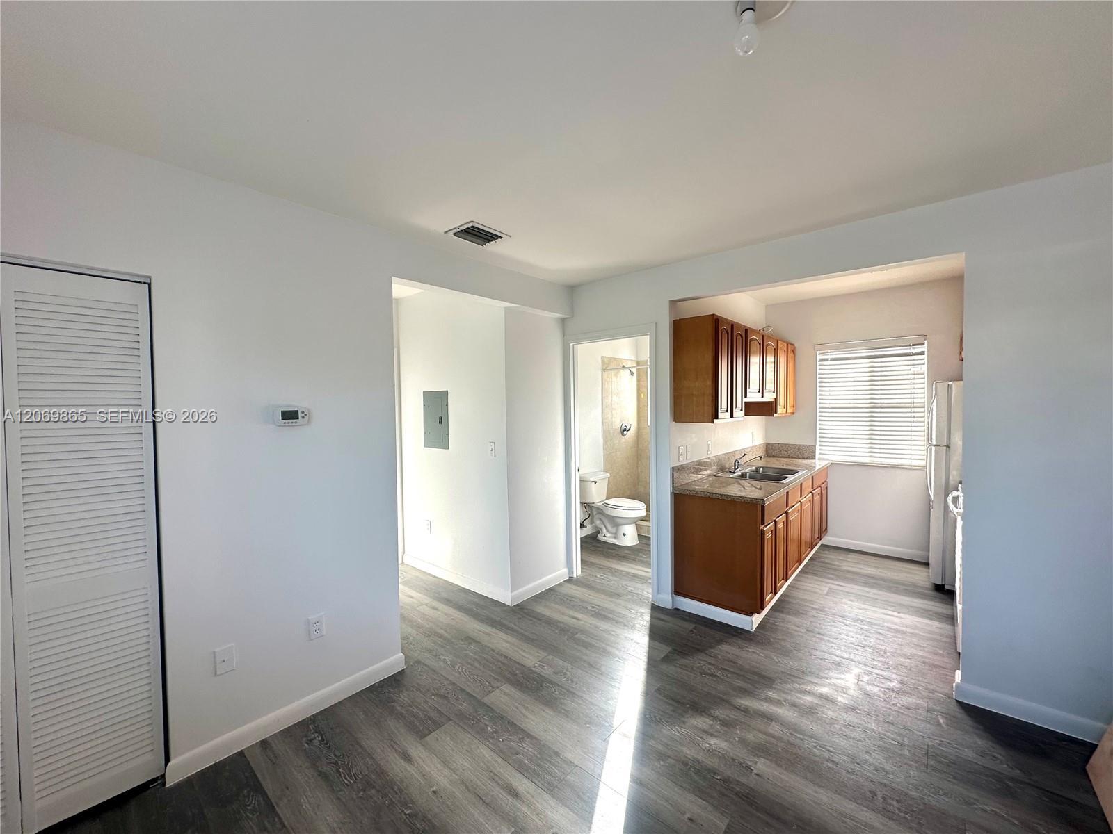 7130 Rue Versailles # 10, Miami Beach FL 33141 photo 2