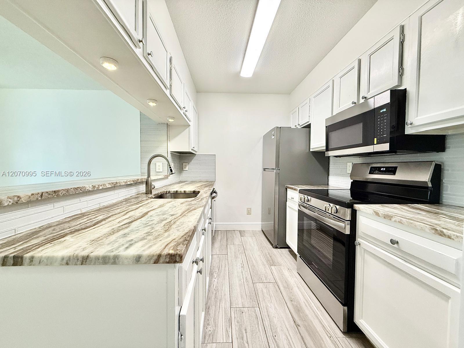 277 Cypress Point Dr # 277, Palm Beach Gardens FL 33418 photo 3