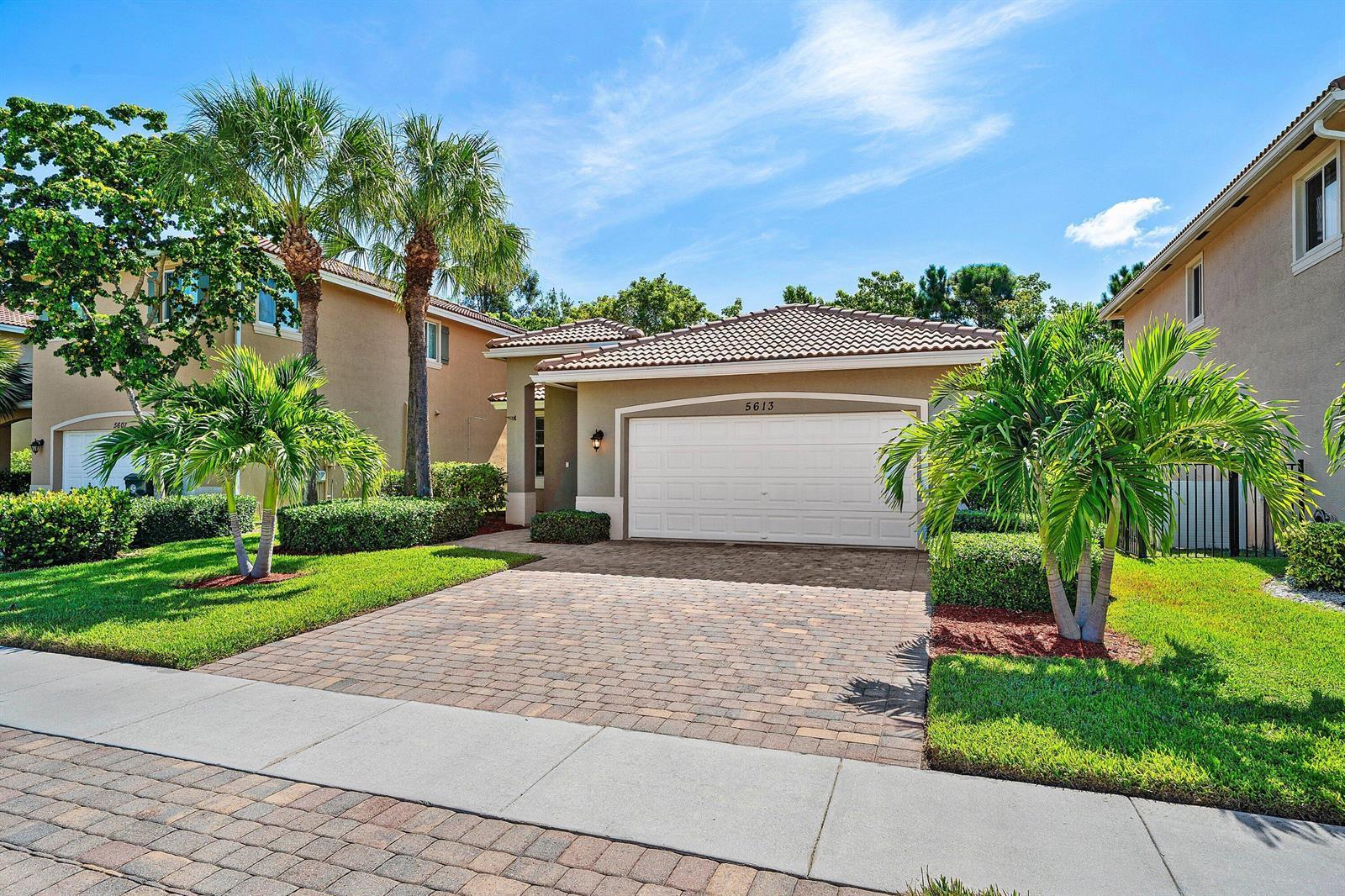 5613 Caranday Palm Drive, FL 33463 photo 3