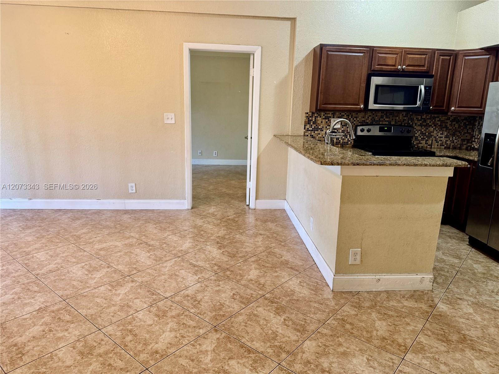 621 Lyons Rd # 9205, Coconut Creek FL 33063 photo 2