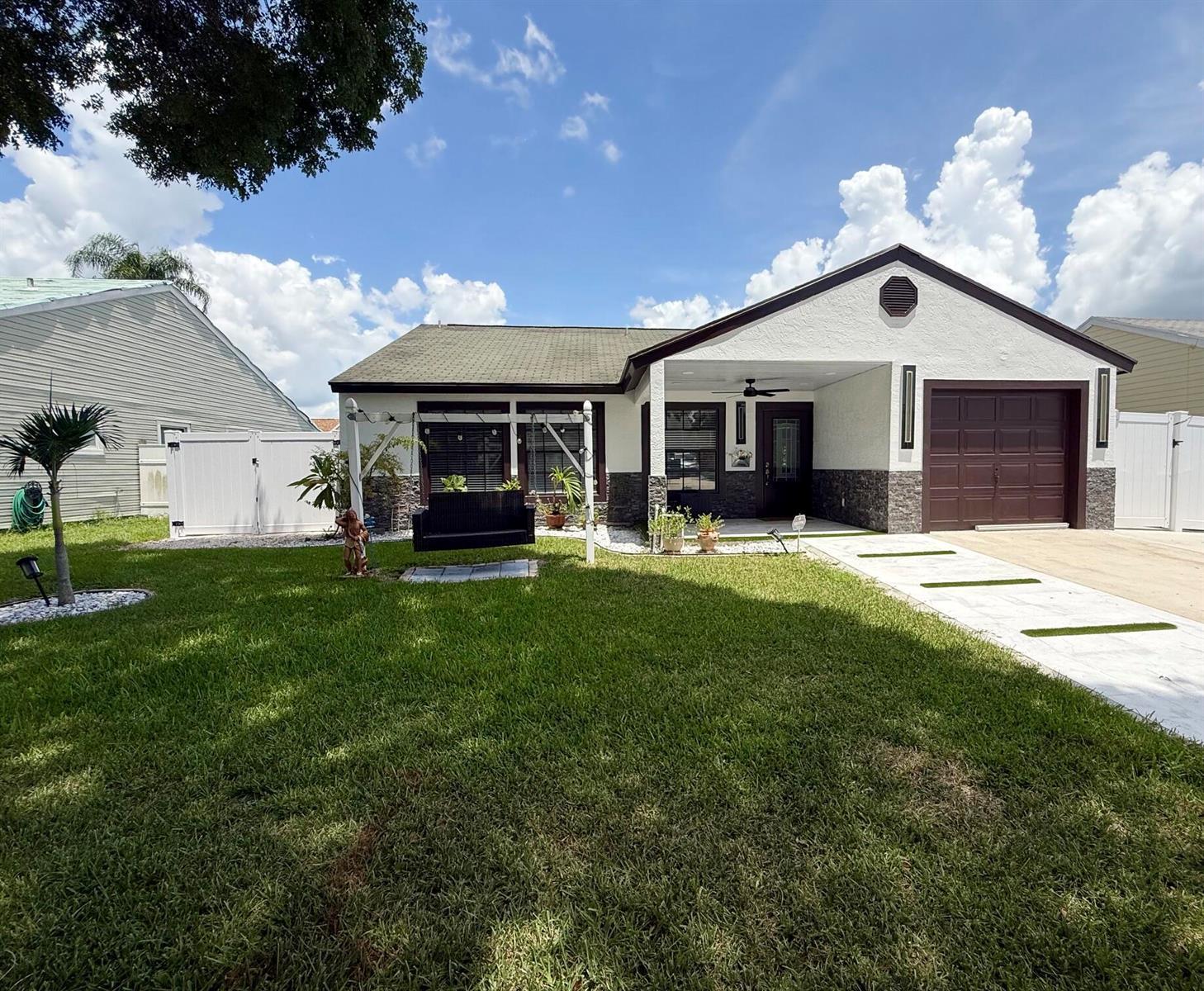 7743 Elwood Drive, FL 33467 photo 2