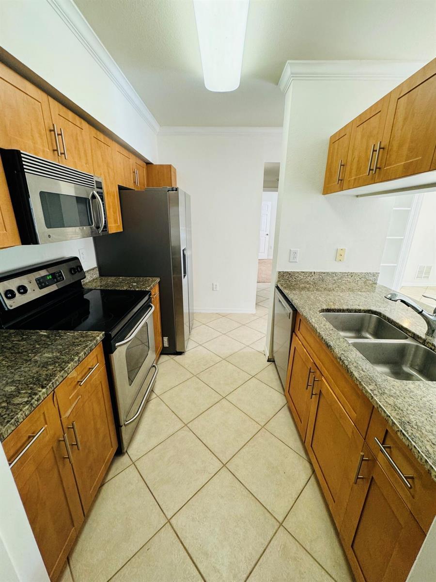 6394 EMERALD DUNES Drive # 202, West Palm Beach FL 33411 photo 2