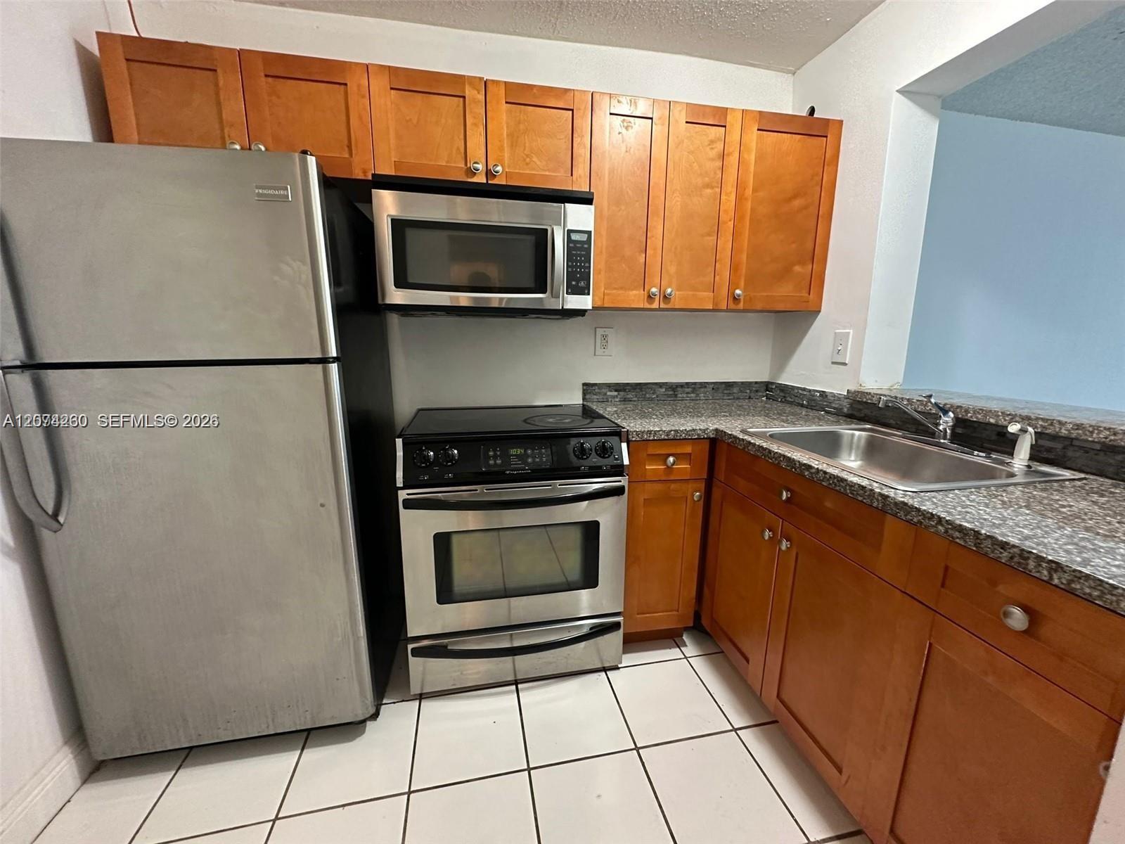 492 NW 165th St Rd # 210, Miami FL 33169 photo 4