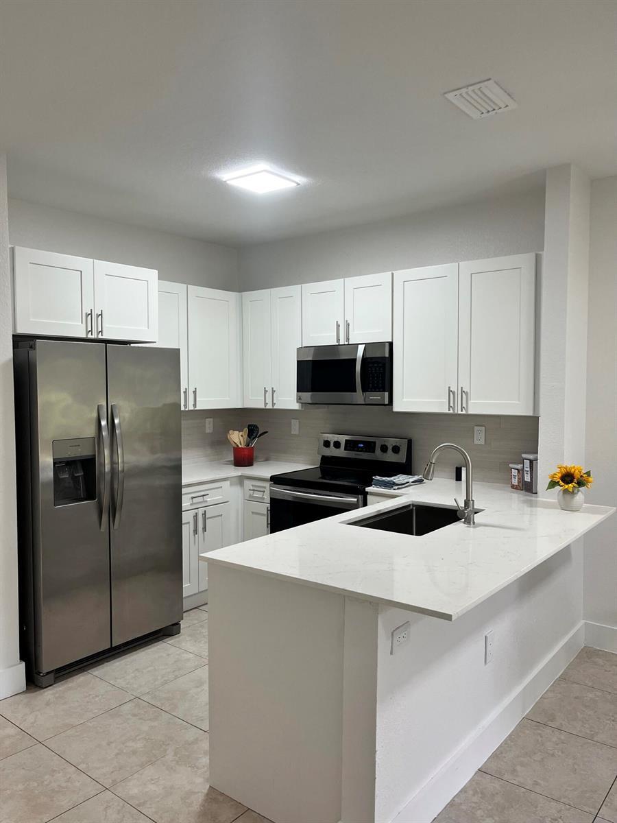 4414 WOODLAND Circle, Tamarac FL 33319 photo 5