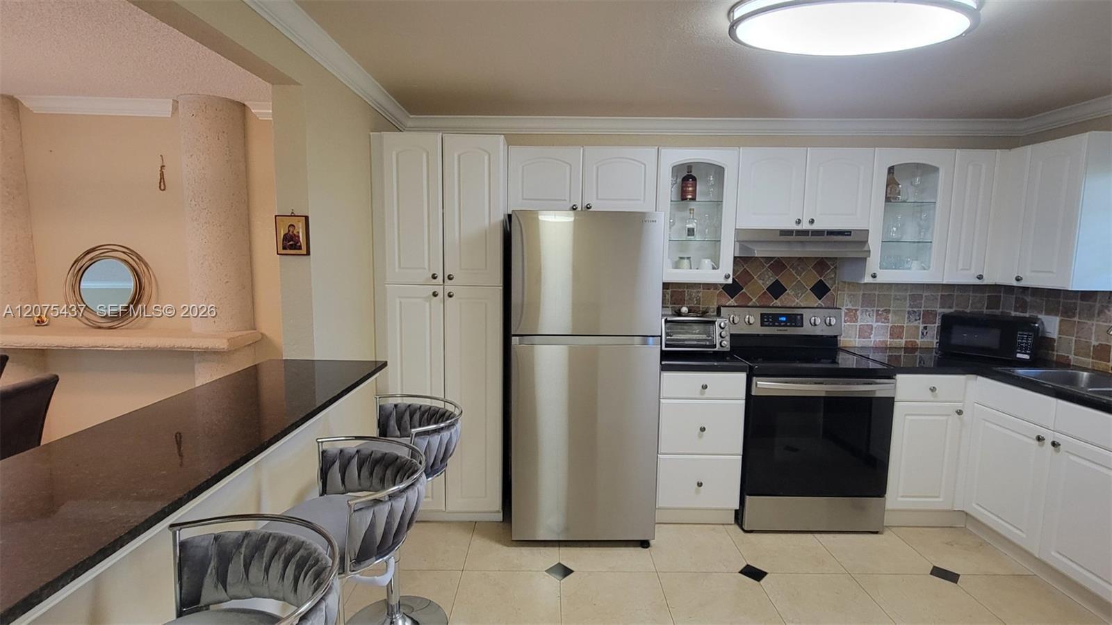 2410 Deer Creek Country Club Blvd # 310E, Deerfield Beach FL 33442