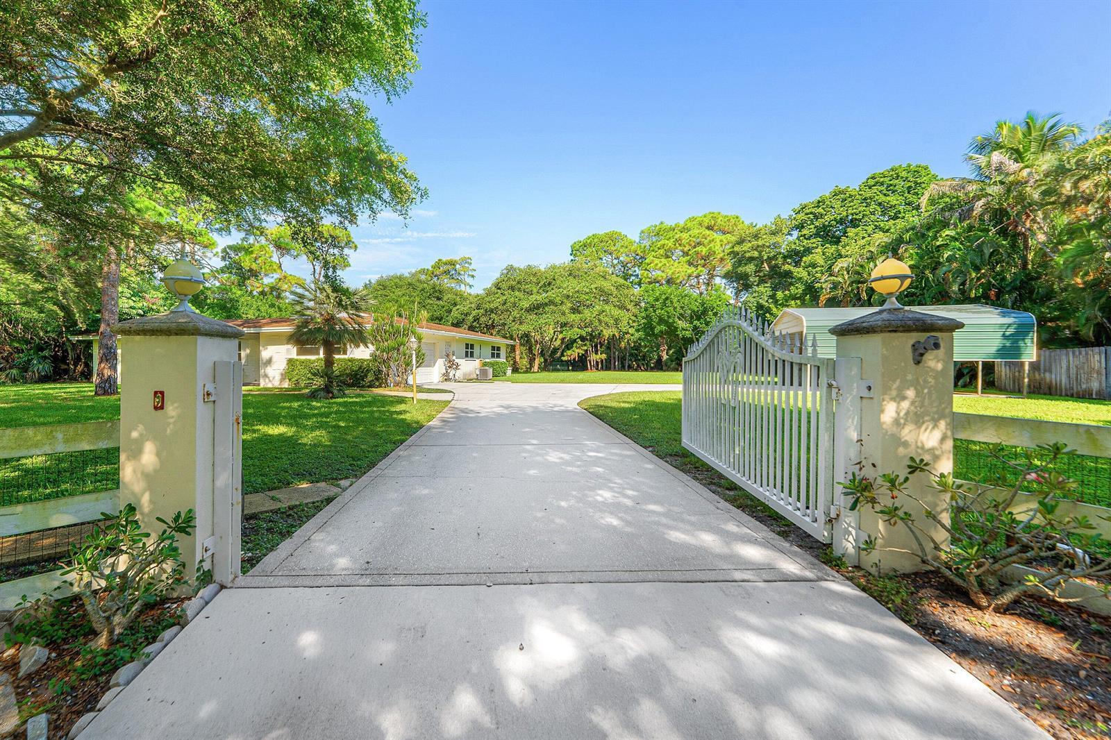 8645 Square Lake Drive, Palm Beach Gardens FL 33418 photo 2
