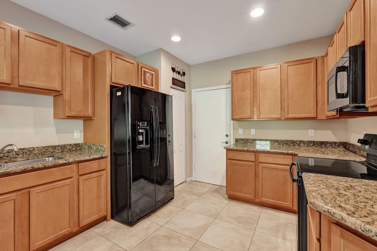 4603 Cohune Palm Court, FL 33463 photo 3