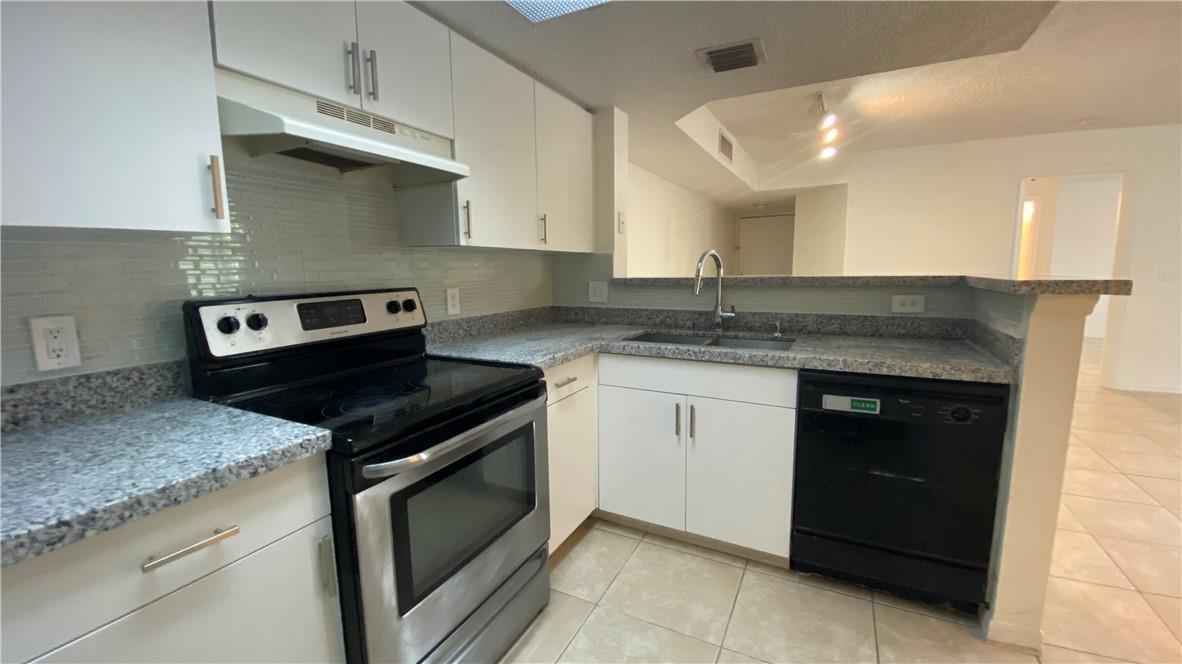 5045 WILES Road # 205, Coconut Creek FL 33073 photo 2