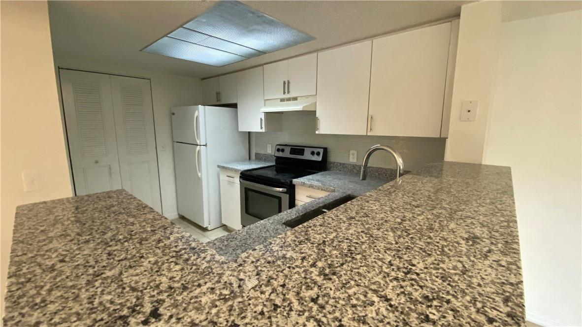 5045 WILES Road # 205, Coconut Creek FL 33073