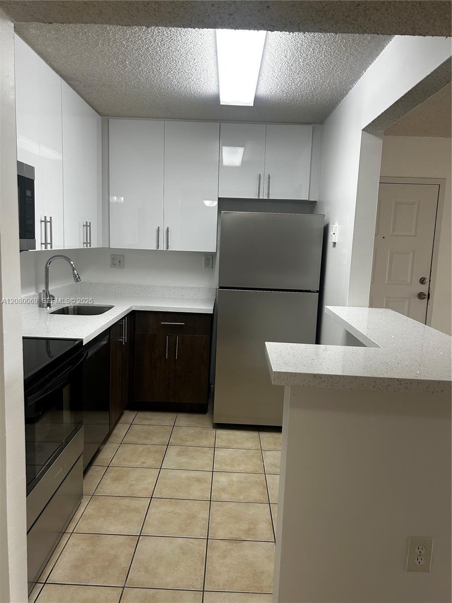 7180 NW 179th St # 211, Hialeah FL 33015