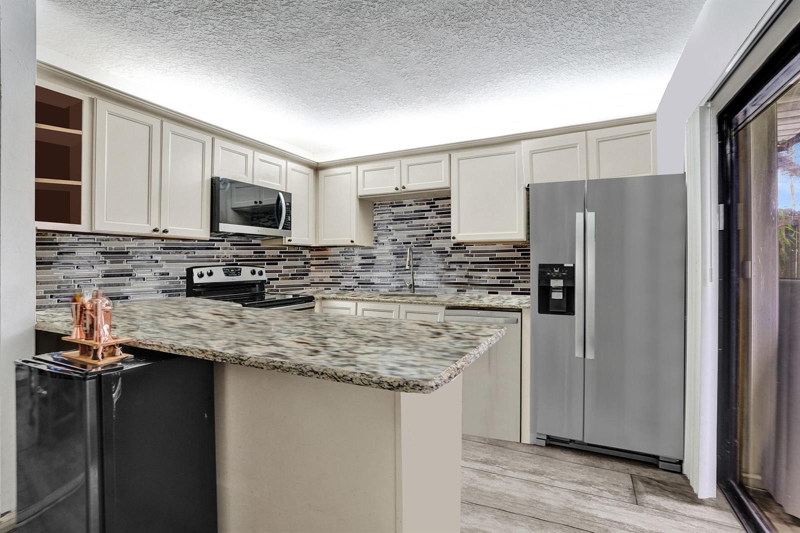 9993 NW 7th Street, Plantation FL 33324