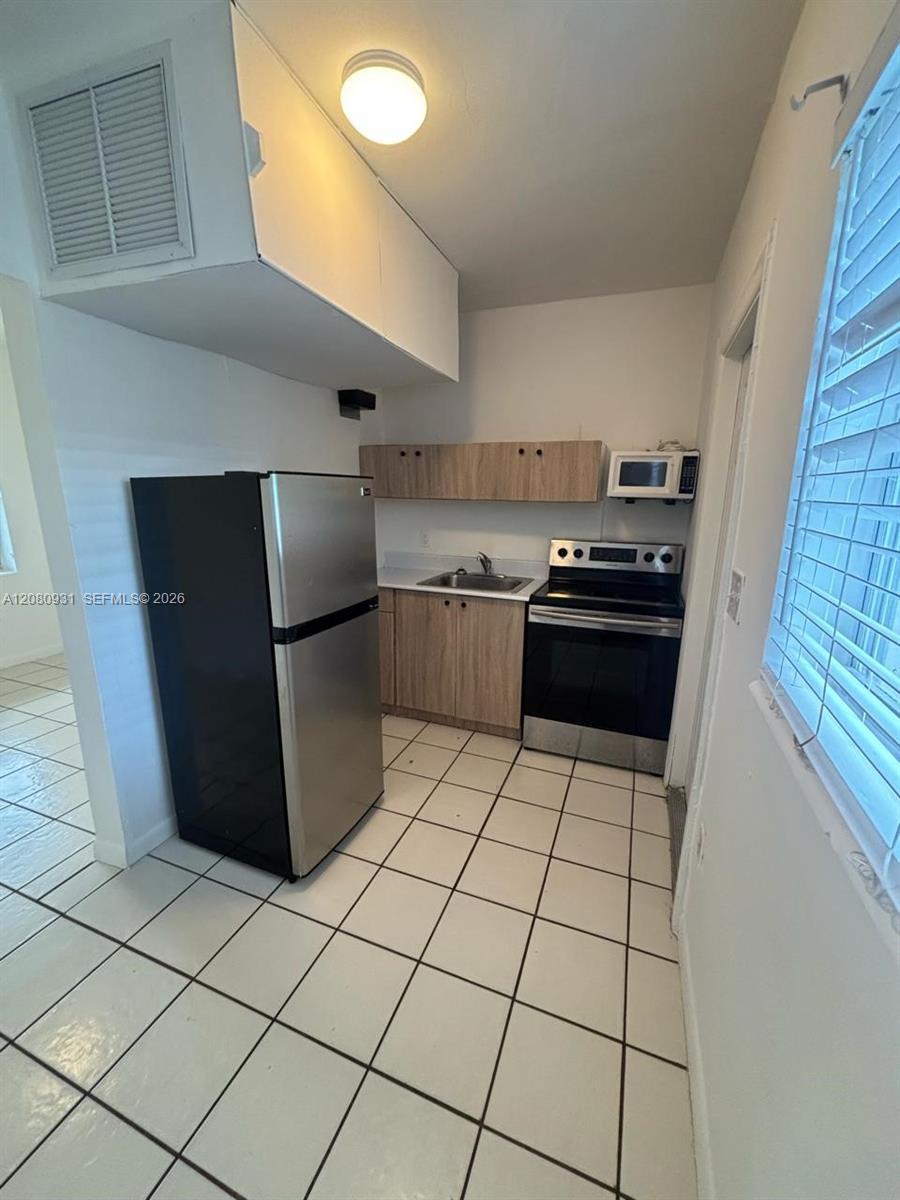 1987 NW 56th St # 0, Miami FL 33142 photo 2