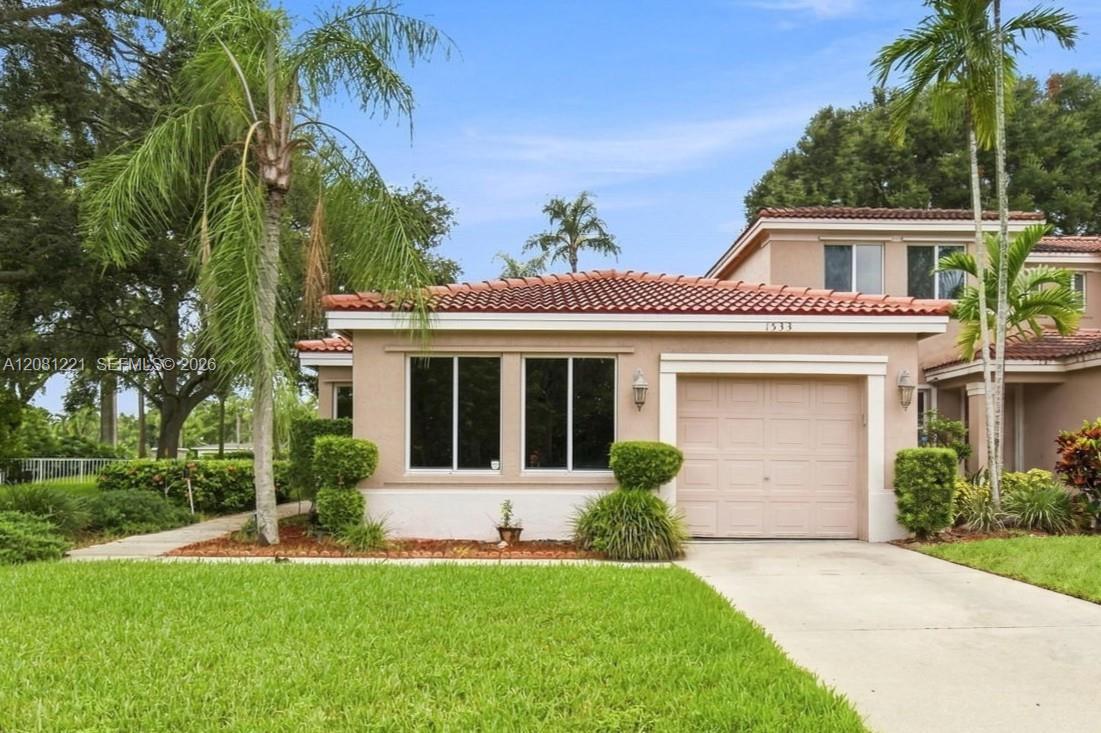 1533 W Harmony Lake Cir, Davie FL 33324