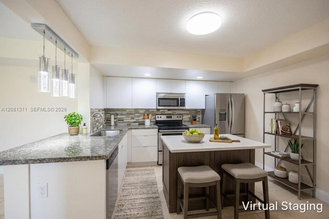 5681 Riverside Dr, Coral Springs FL 33067 photo 4