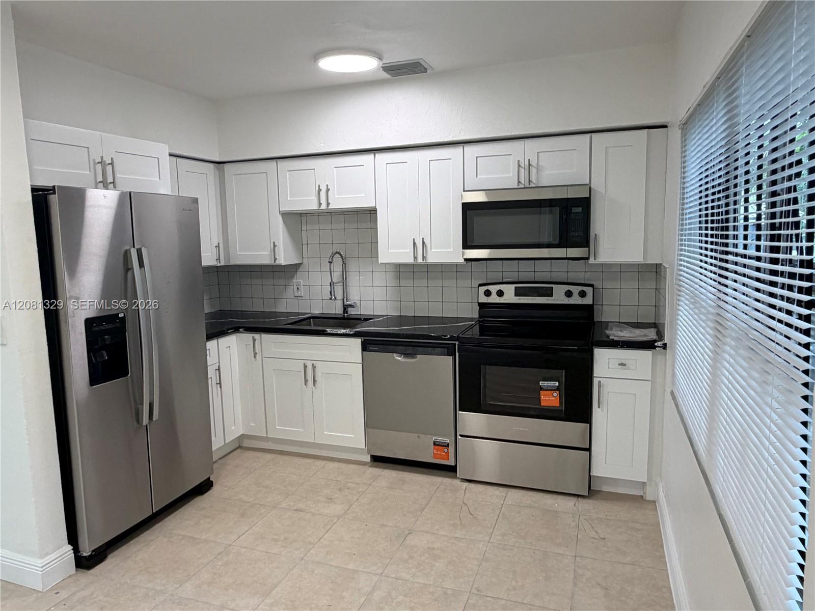 1311 NE NE 157 ST, North Miami Beach FL 33162 photo 3
