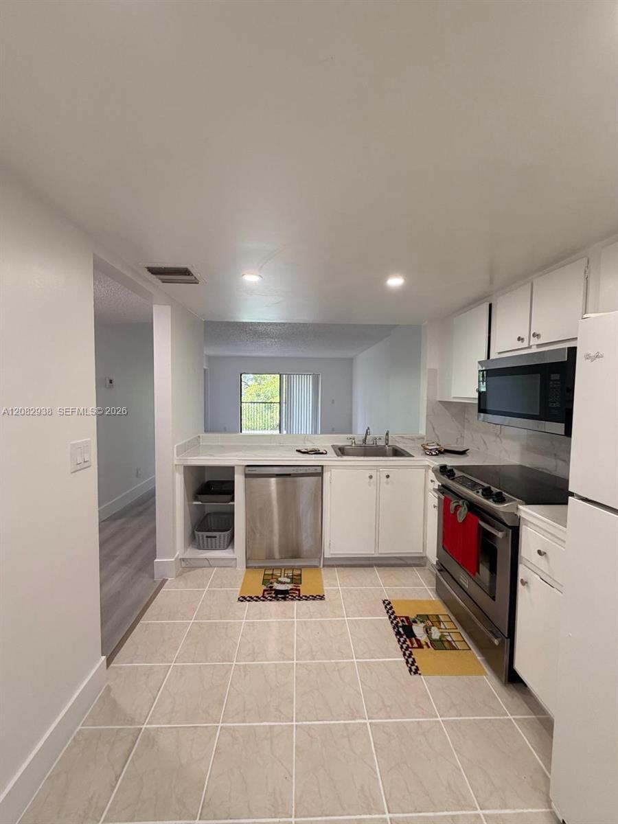 6575 W Oakland Park Blvd # 303, Lauderhill FL 33313 photo 2