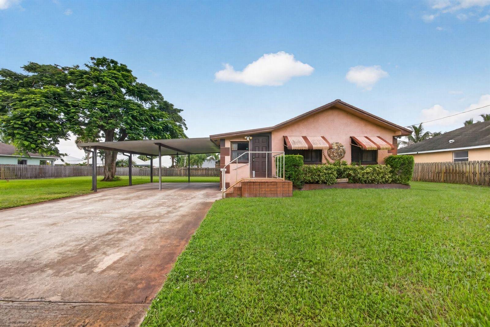 17596 CINQUEZ PARK Road W, Jupiter FL 33458 photo 2
