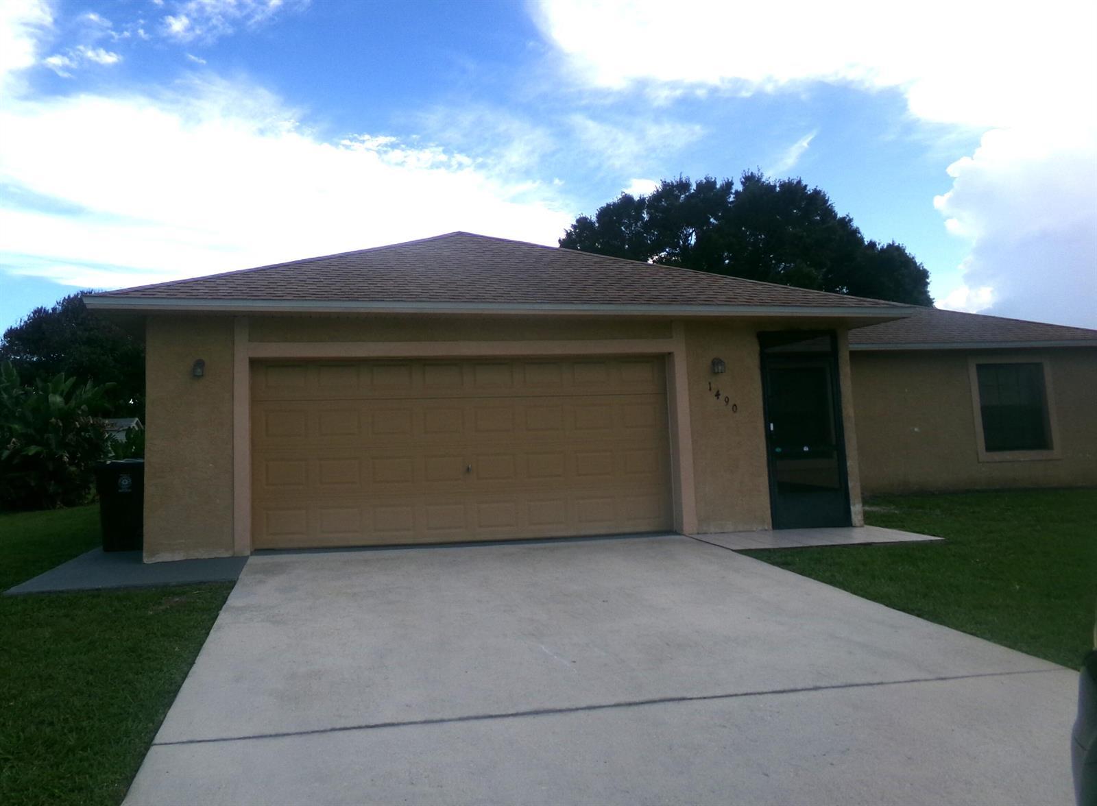 1490 SE Grapeland Avenue, Port St. Lucie FL 34952