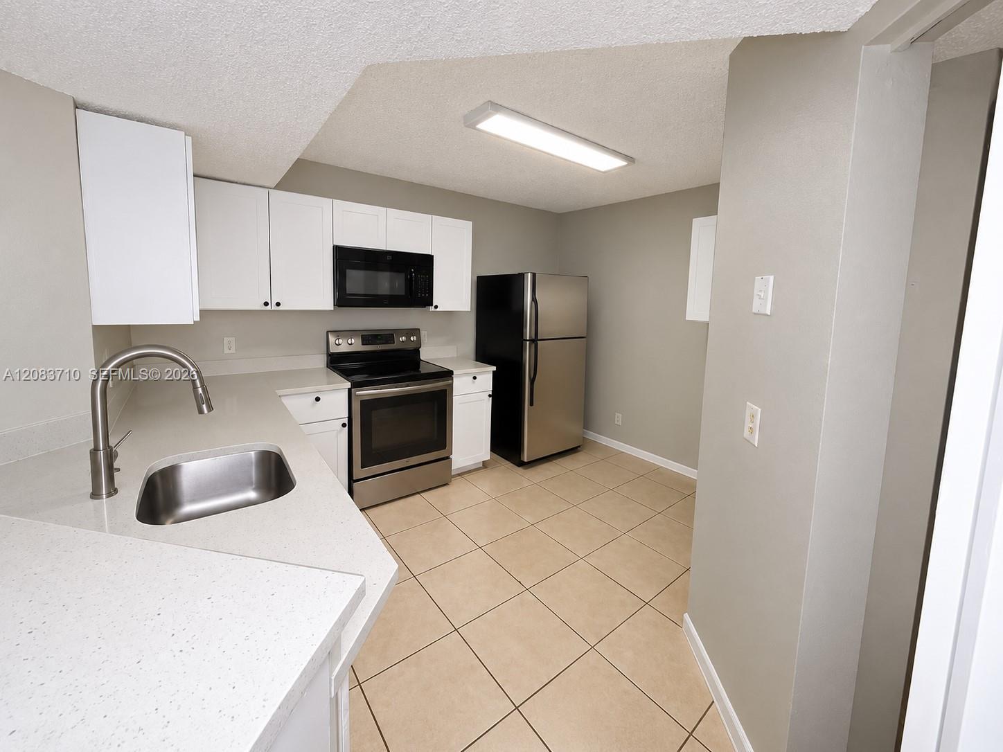 8821 Wiles Rd # 102, Coral Springs FL 33067 photo 2
