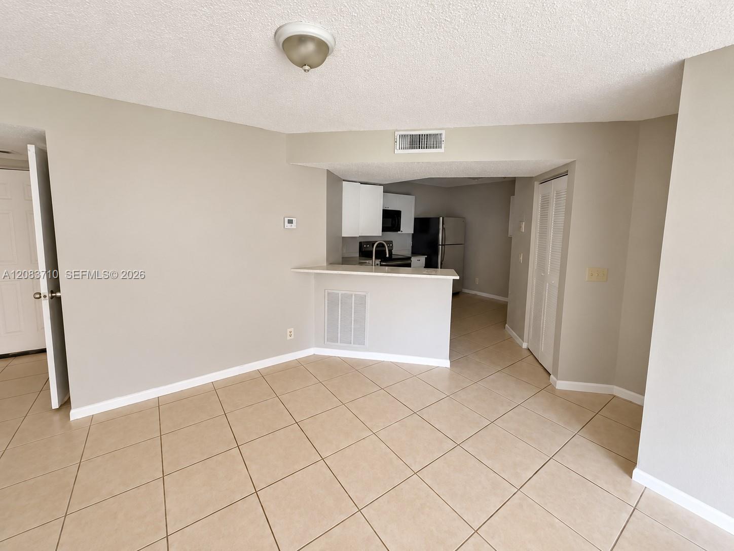 8821 Wiles Rd # 102, Coral Springs FL 33067 photo 3