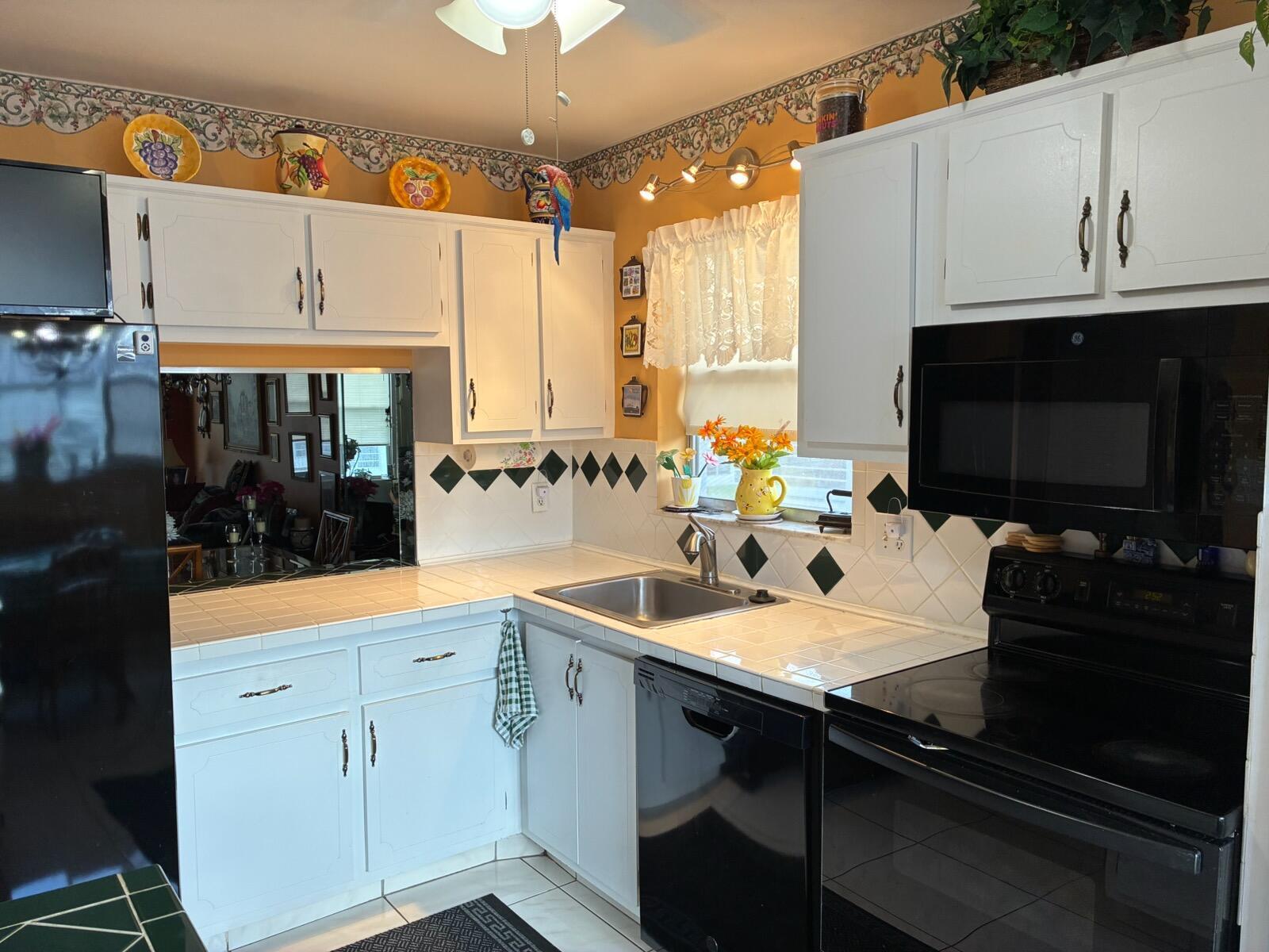 8350 SANDS POINT Boulevard # E310, Tamarac FL 33321 photo 2