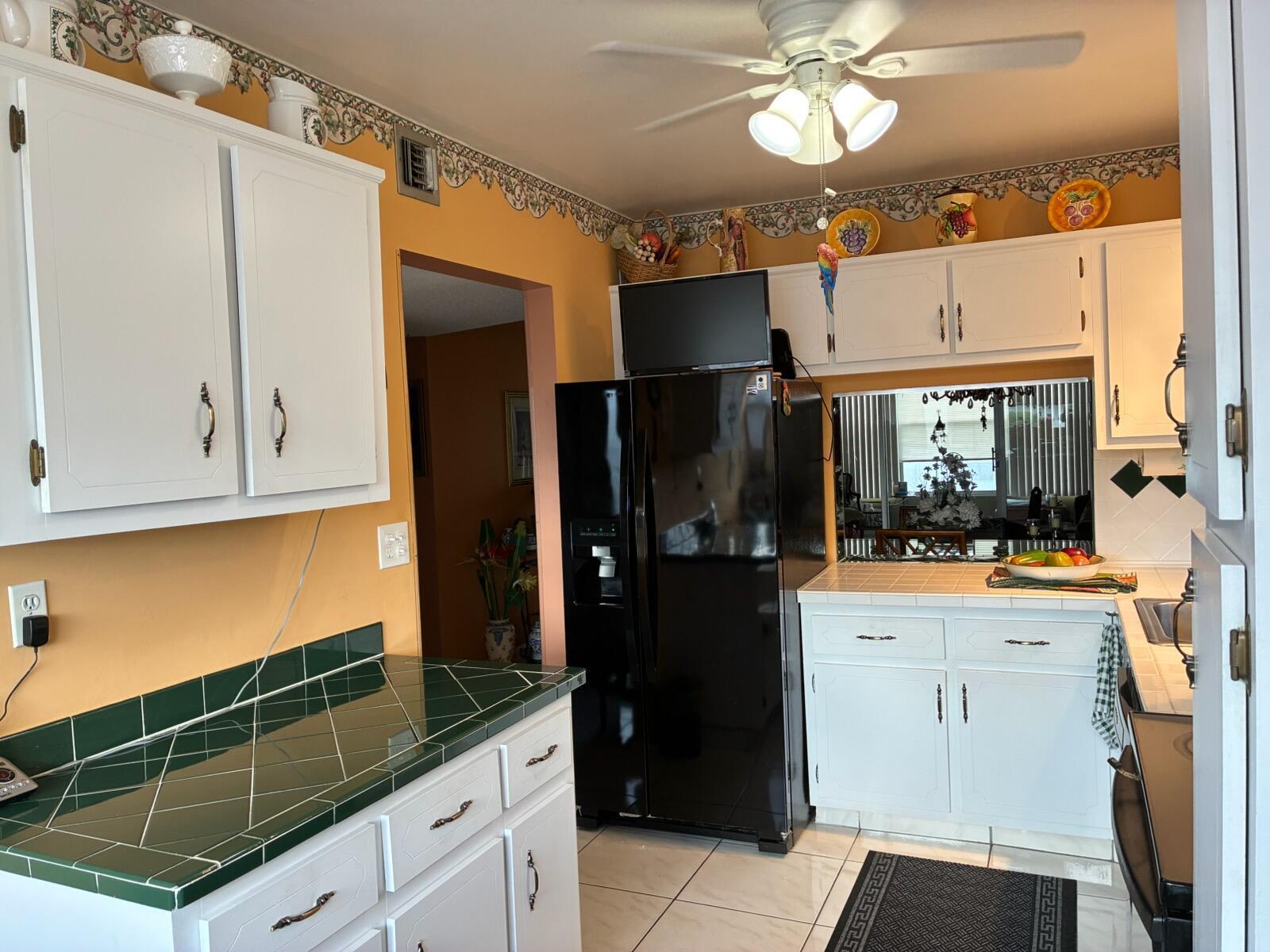 8350 SANDS POINT Boulevard # E310, Tamarac FL 33321 photo 3
