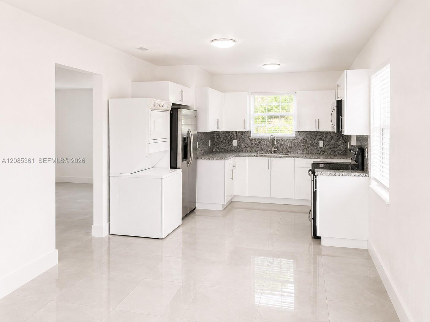 1114 NW 59th St, Miami FL 33127 photo 2
