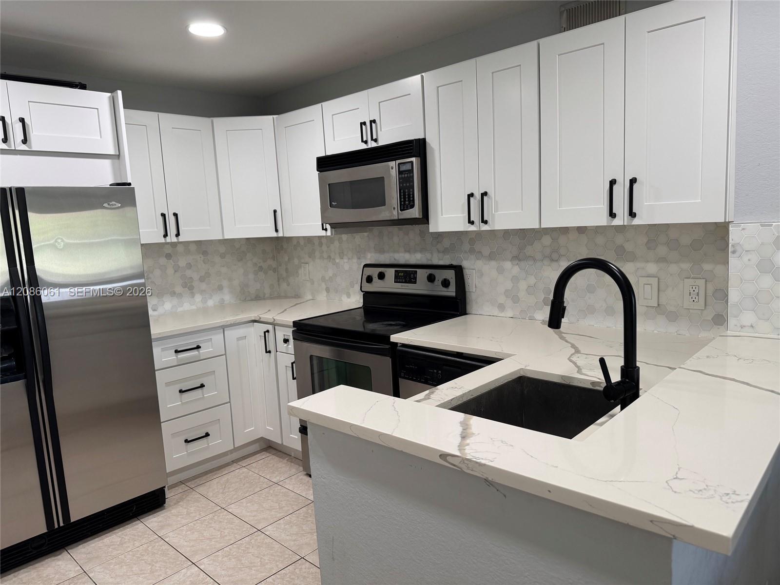 1825 Palm Cove Blvd # 303, Delray Beach FL 33445 photo 2
