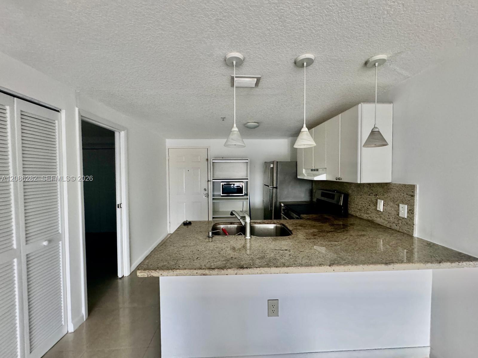 218 SW 8th Ave # 303, Miami FL 33130