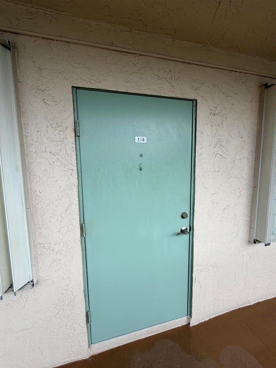 700 VILLAGE GREEN Court # 314, Palm Springs FL 33461 photo 2