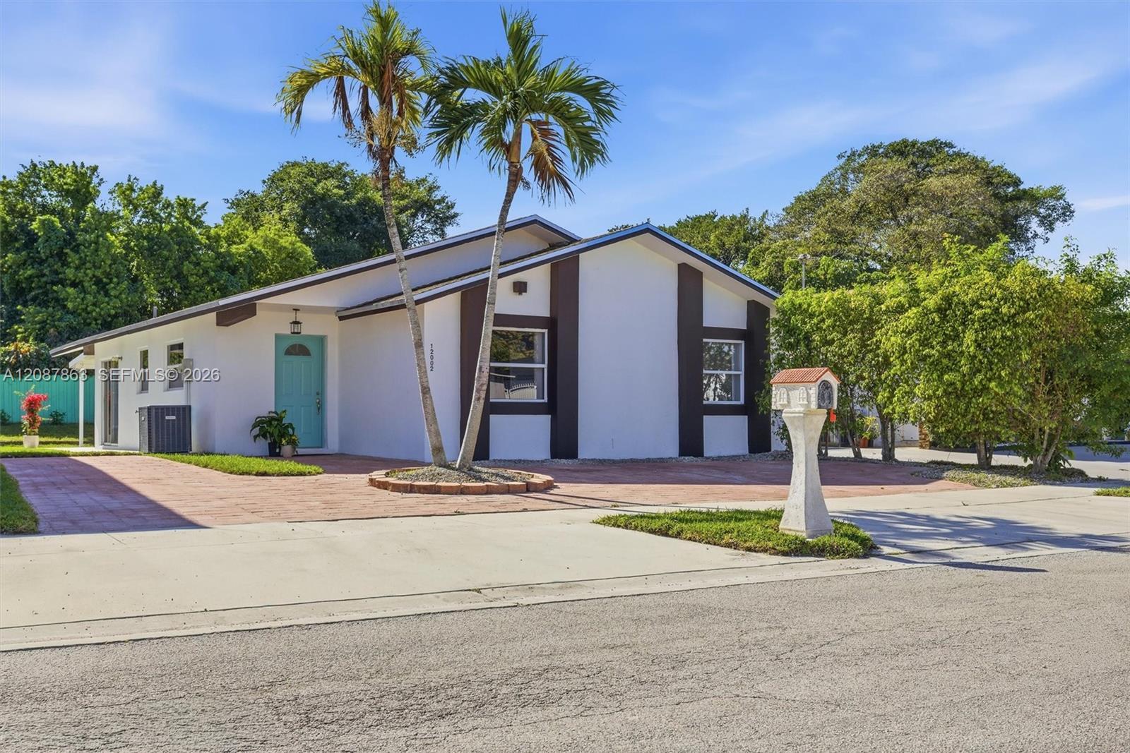 Property at 12002 SW 210th St, Miami FL 33177
