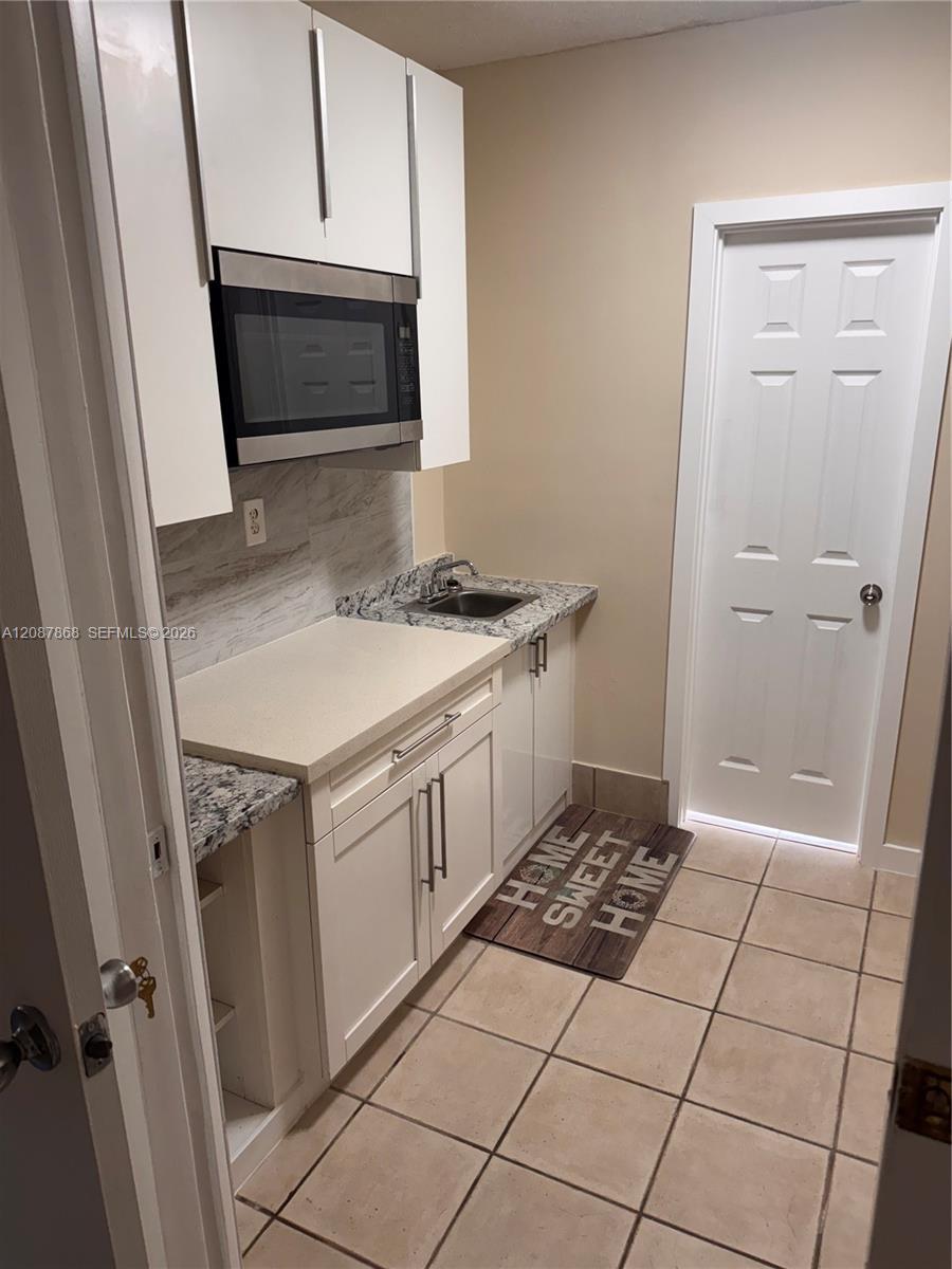 9900 W Calusa Club Dr # 1, Miami FL 33186