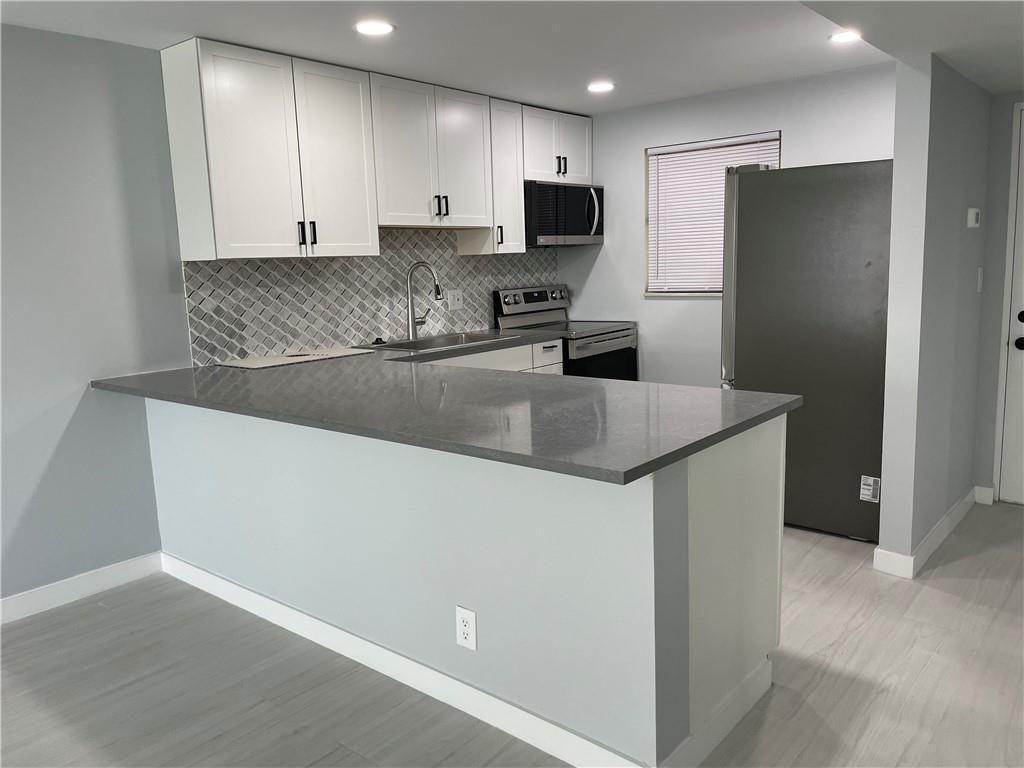 2322 S CYPRESS BEND Drive # 210, Pompano Beach FL 33069 photo 4