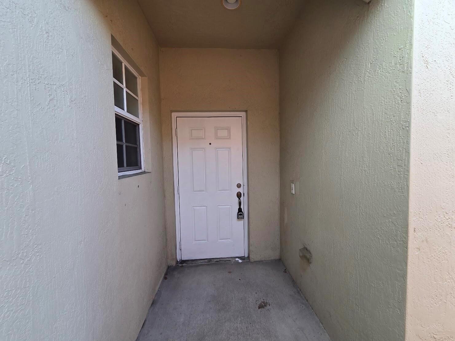 4409 COQUINA WINDS Way, FL 33463 photo 2