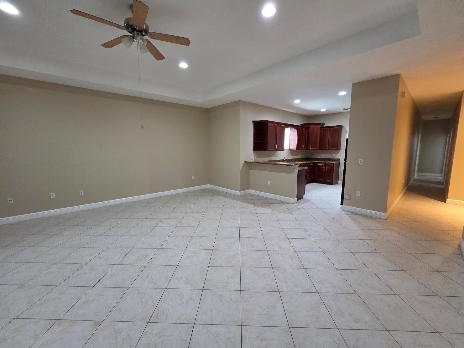 4409 COQUINA WINDS Way, FL 33463 photo 5