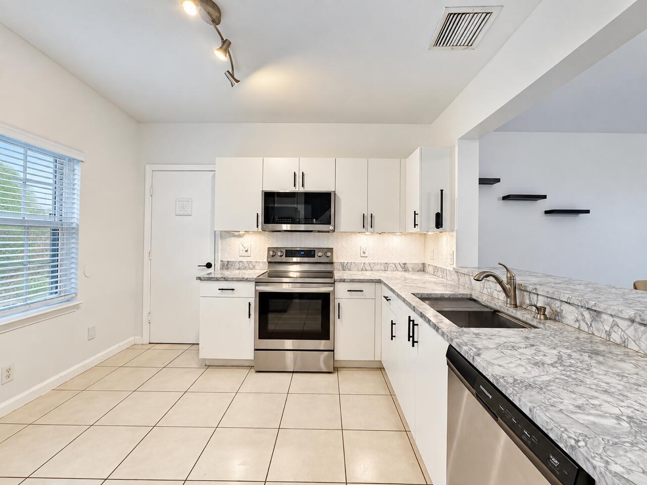 9491 Stanley Lane, Tamarac FL 33321 photo 3