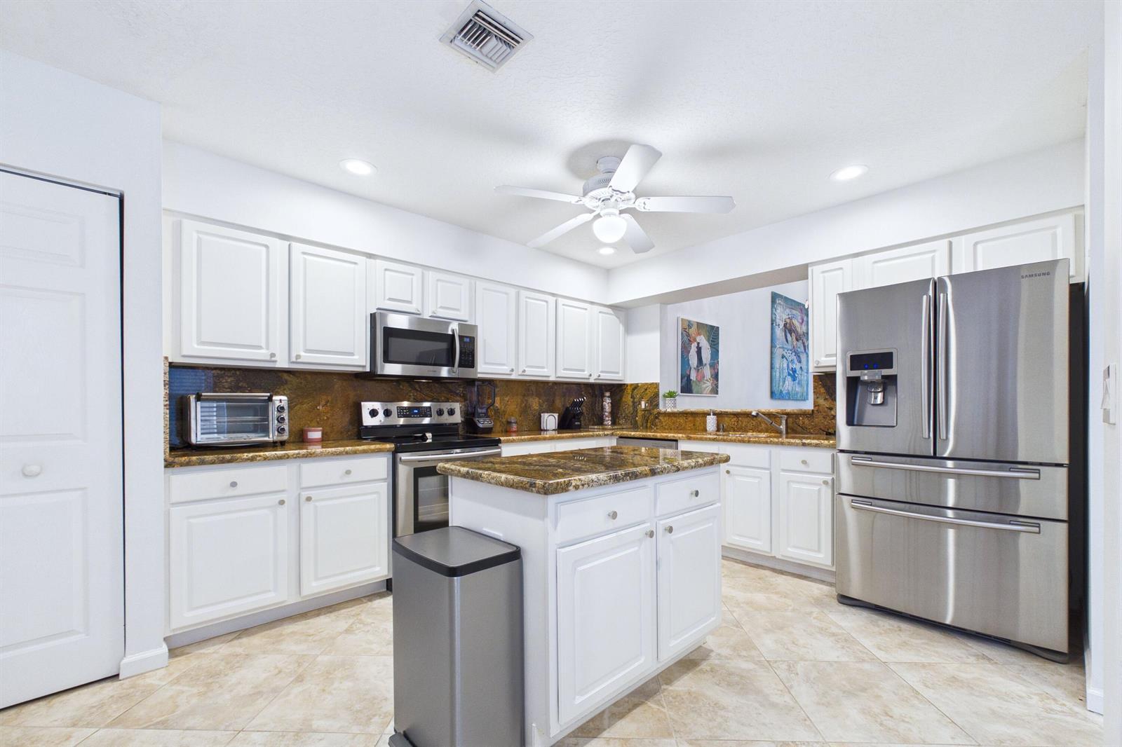 412 Coral Cove Drive, North Palm Beach FL 33408 photo 3