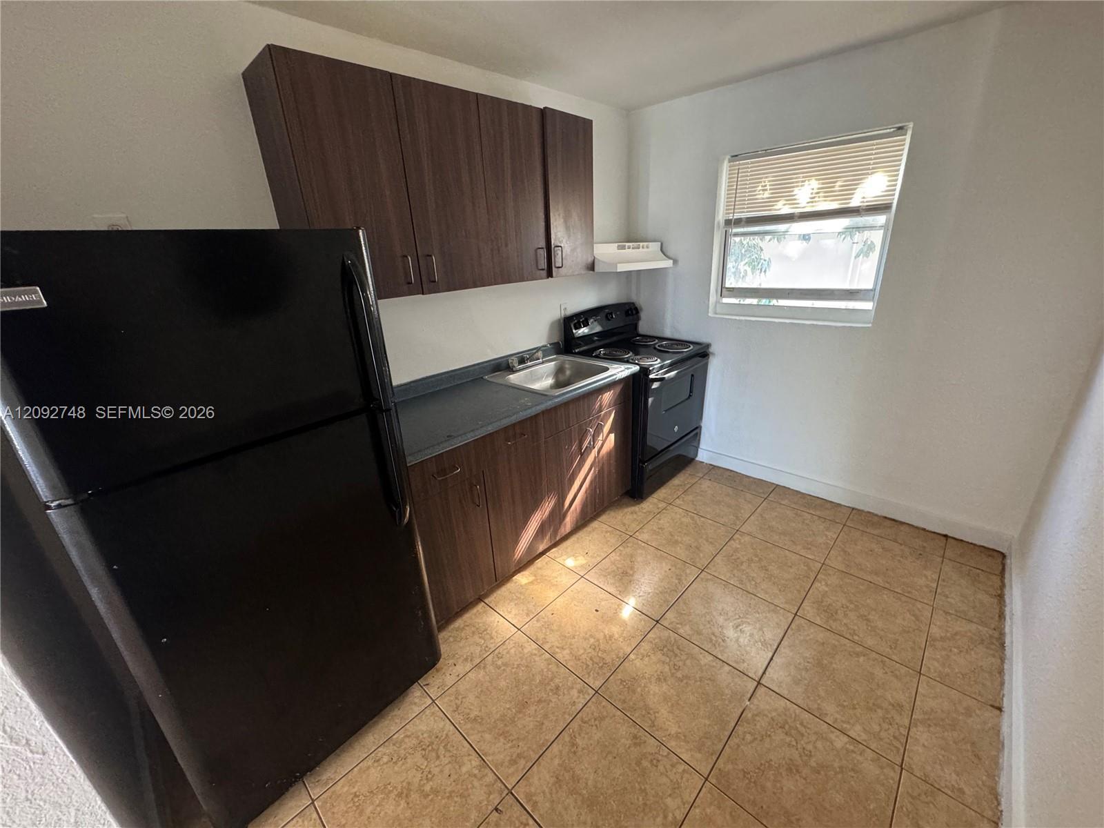 1306 NW 61st St # 8, Miami FL 33142 photo 3