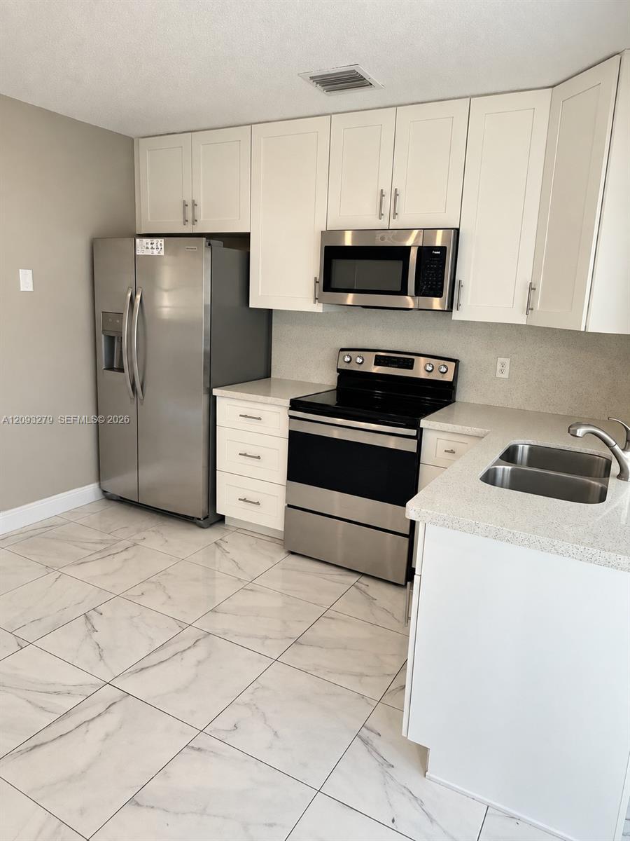 1904 NW 45th Ct # 1904, Tamarac FL 33309 photo 3