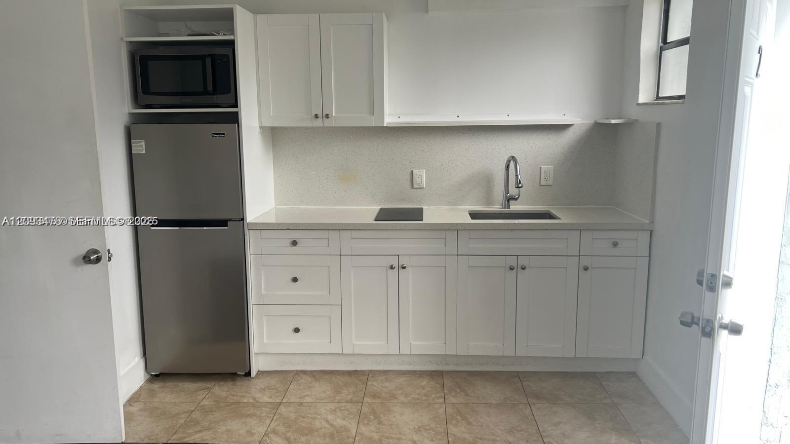 1053 NW 30th St # 2, Miami FL 33127 photo 2