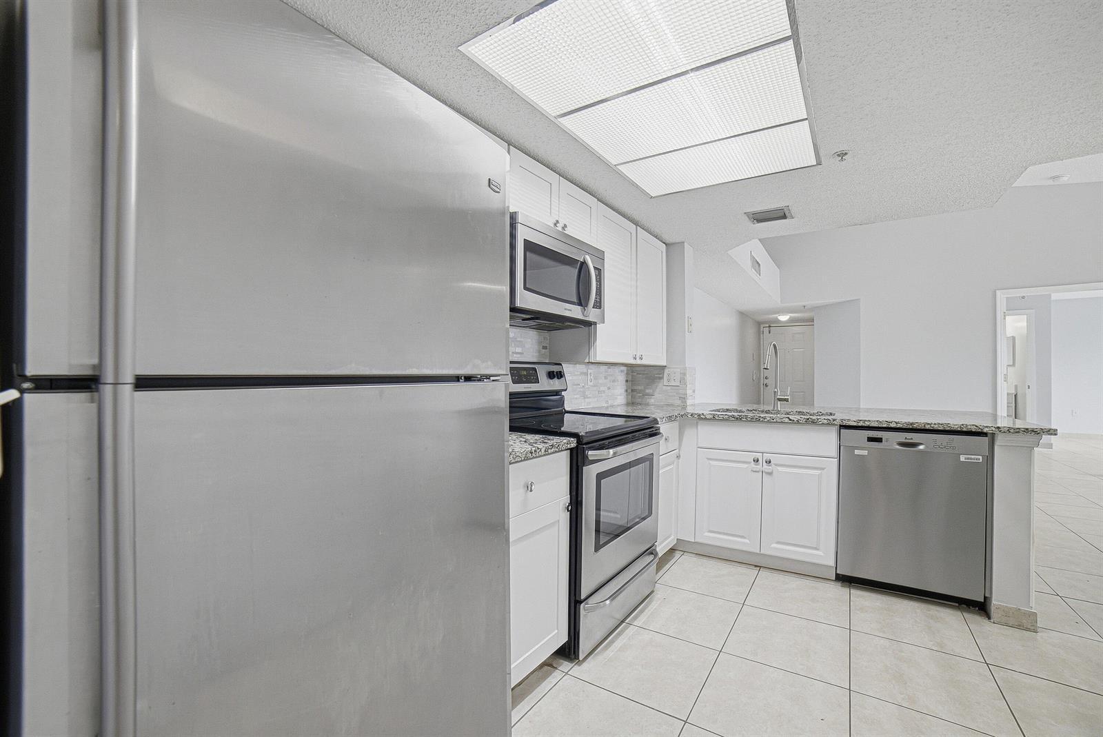 5045 WILES Road # 308, Coconut Creek FL 33073 photo 2