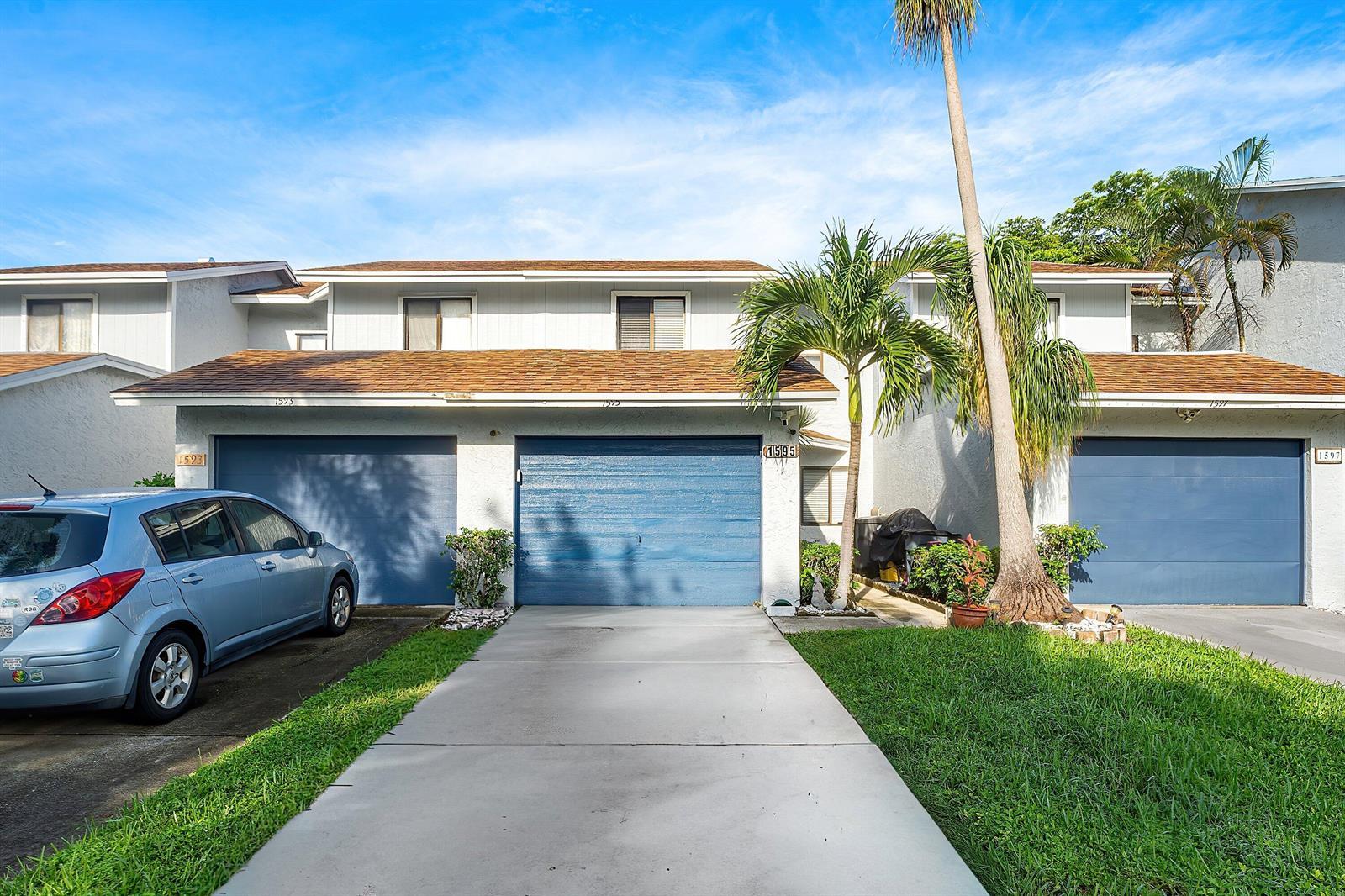 1595 Woodbridge Lakes Circle, West Palm Beach FL 33406 photo 2