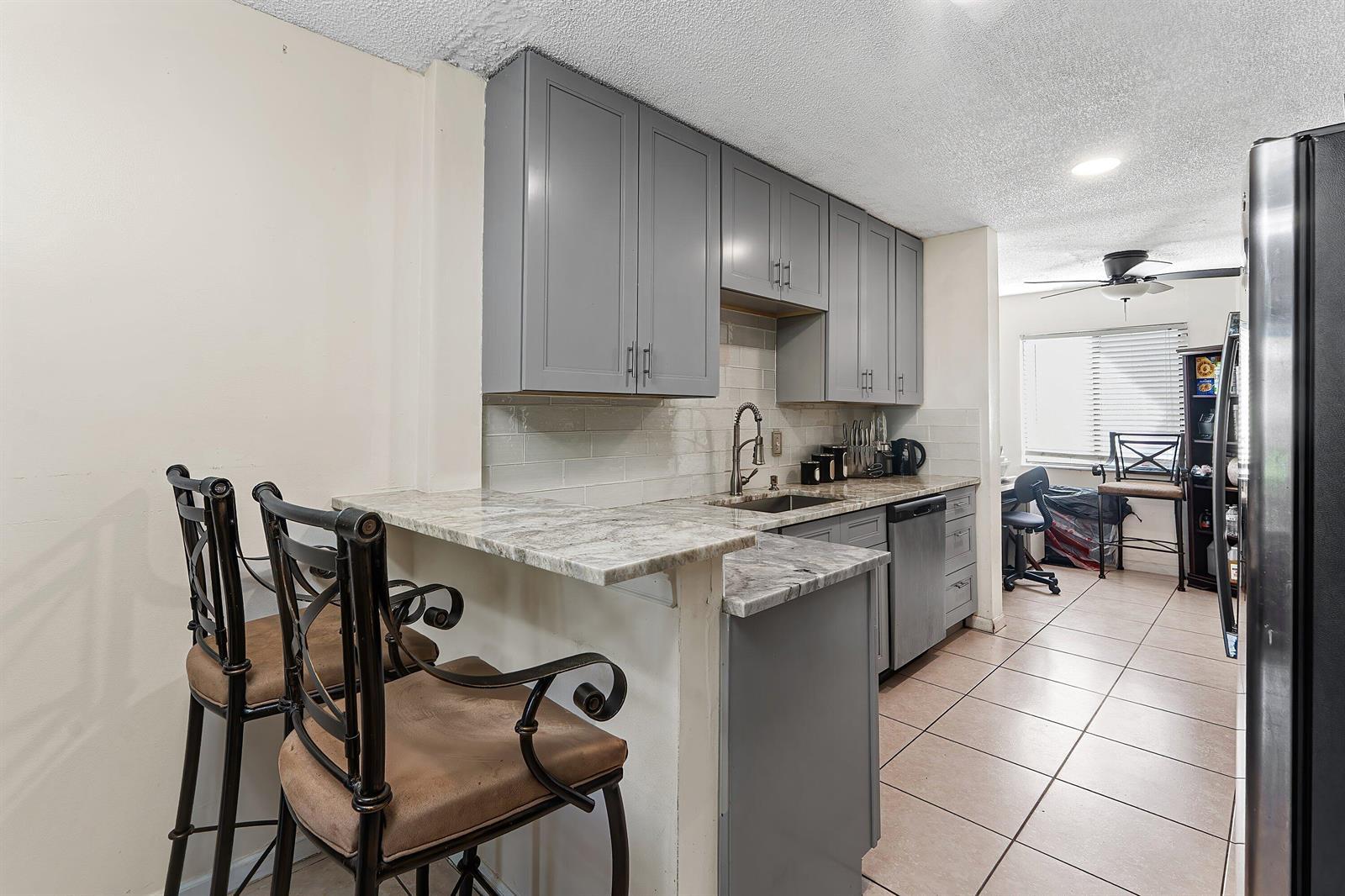 1595 Woodbridge Lakes Circle, West Palm Beach FL 33406 photo 5
