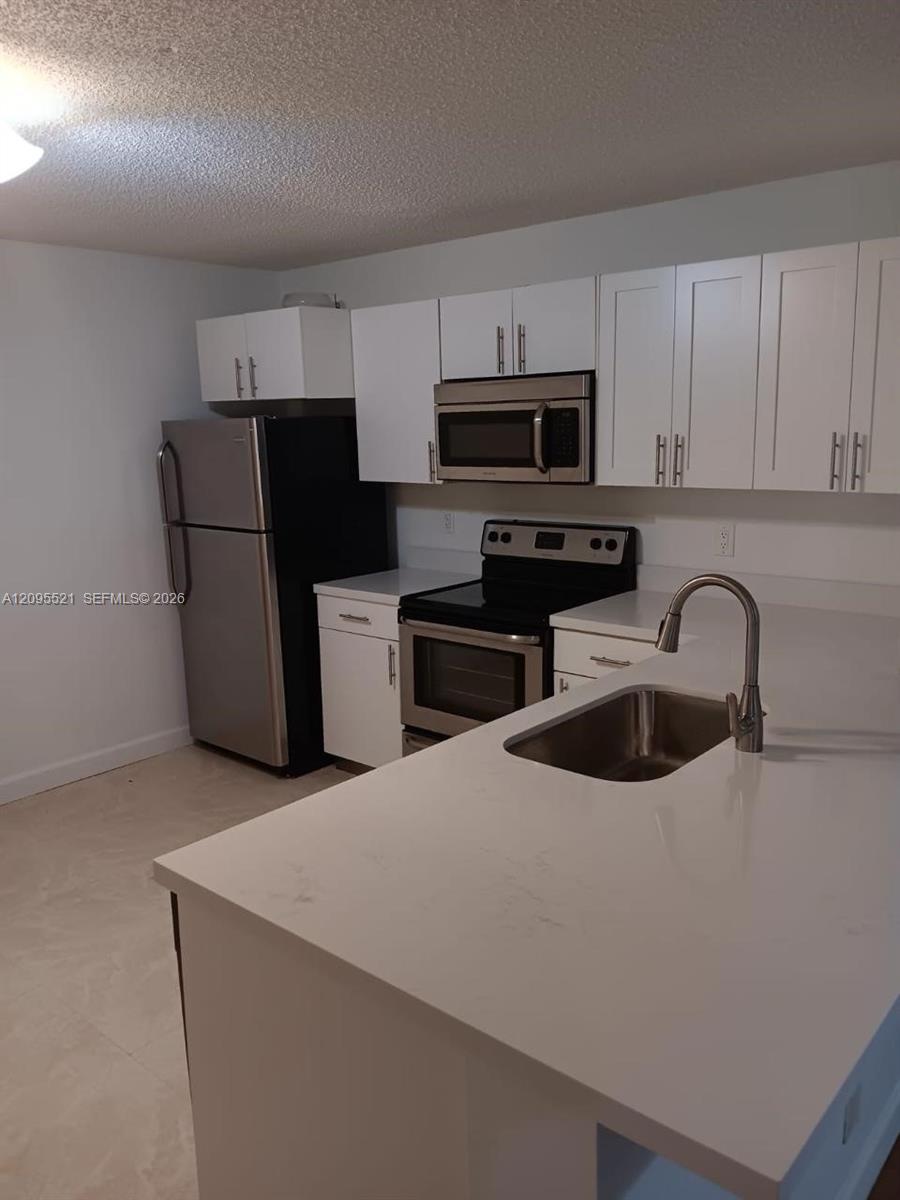 10161 W Sunrise # 104, Plantation FL 33322