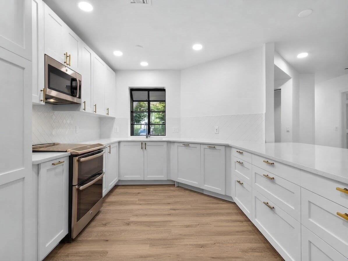 5250 EUROPA Drive # B, Boynton Beach FL 33437 photo 2