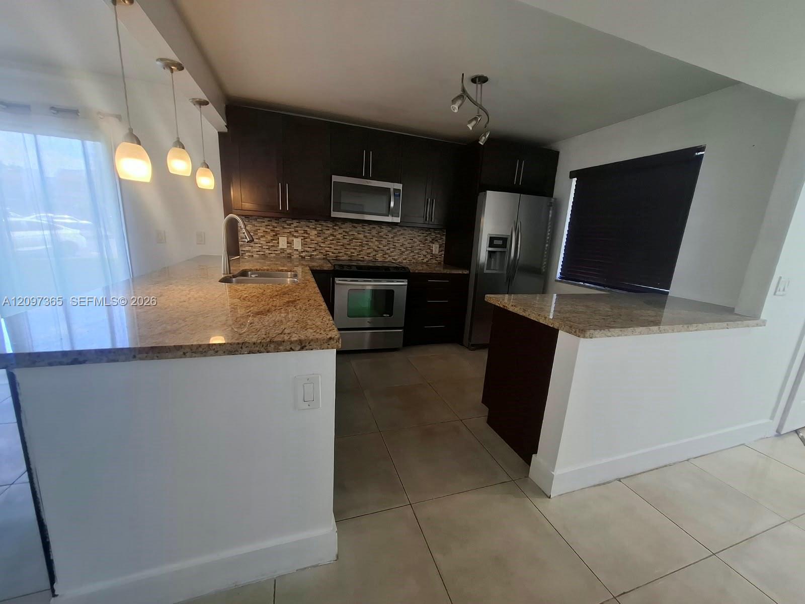 320 Racquet Club Rd # 104, Weston FL 33326 photo 2