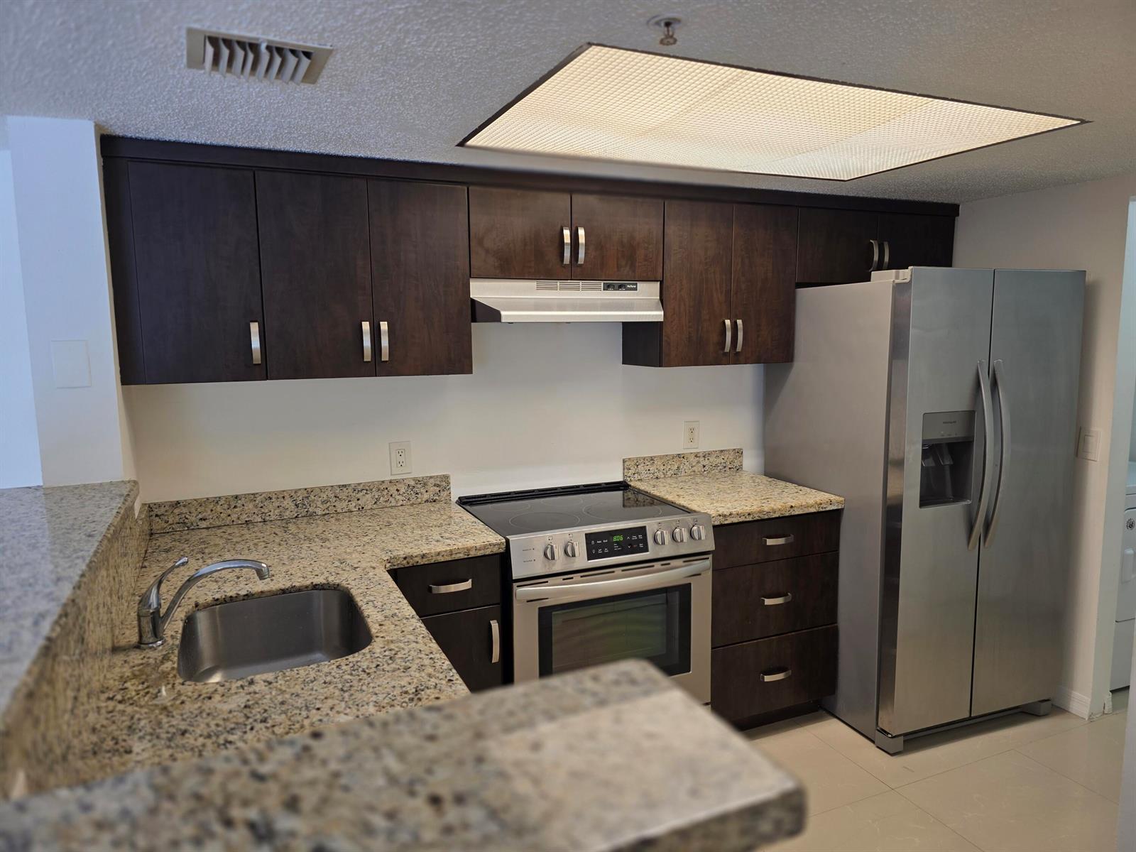 5055 WILES Road # 207, Coconut Creek FL 33073 photo 3